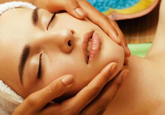 Hands on the face of a girl