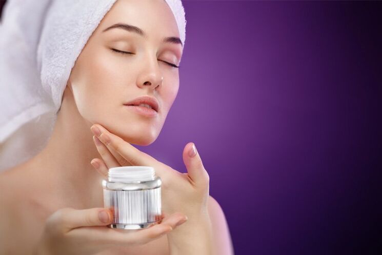 applying skin rejuvenating cream
